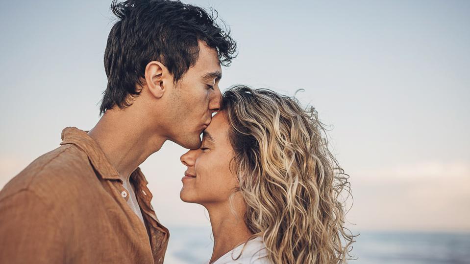 Man kissing his woman