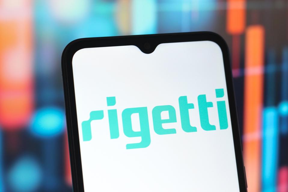 In this photo illustration, the Rigetti Computing logo is...