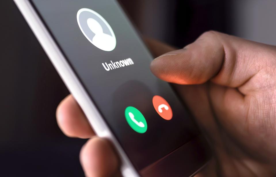 Phone call from unknown number seen on a smartphone.