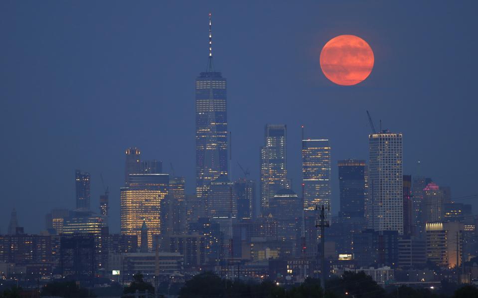 The Full Moon Rises in New York City on the 50th Anniversary of the Launch of Apollo 11