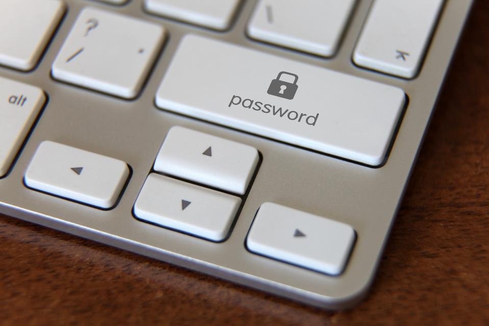 Password and padlock shown on keyboard enter key.