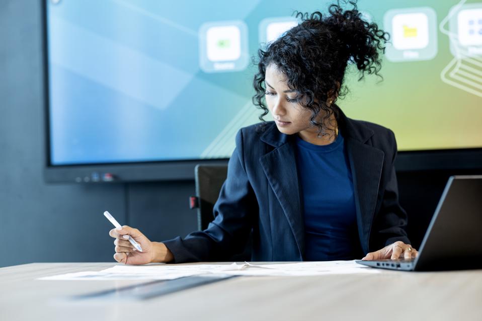 Plan a roadmap for the future with strategic financial planning for your business. A chief financial officer review a financial planning for business process to drive business operation in an office.