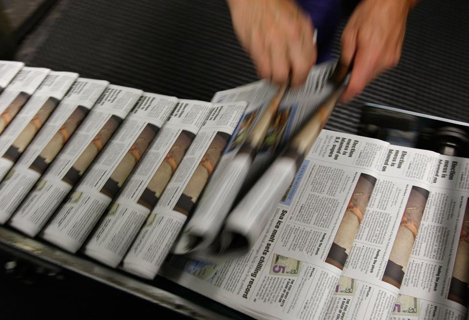 Newspaper Sales Echo Through Economy