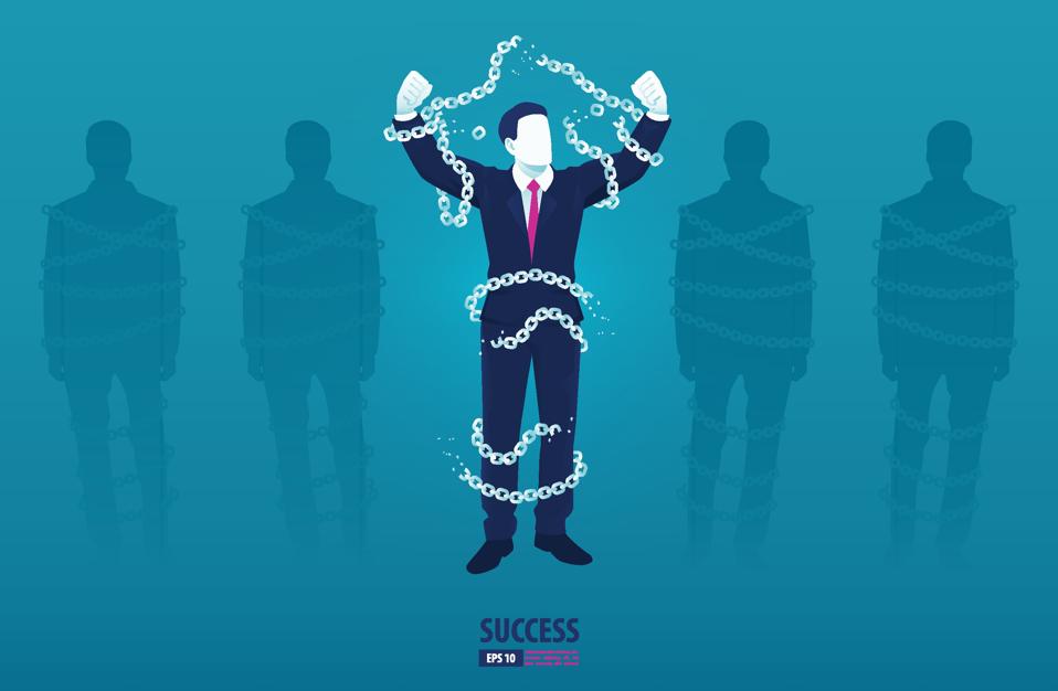 Businessman break chain for freedom