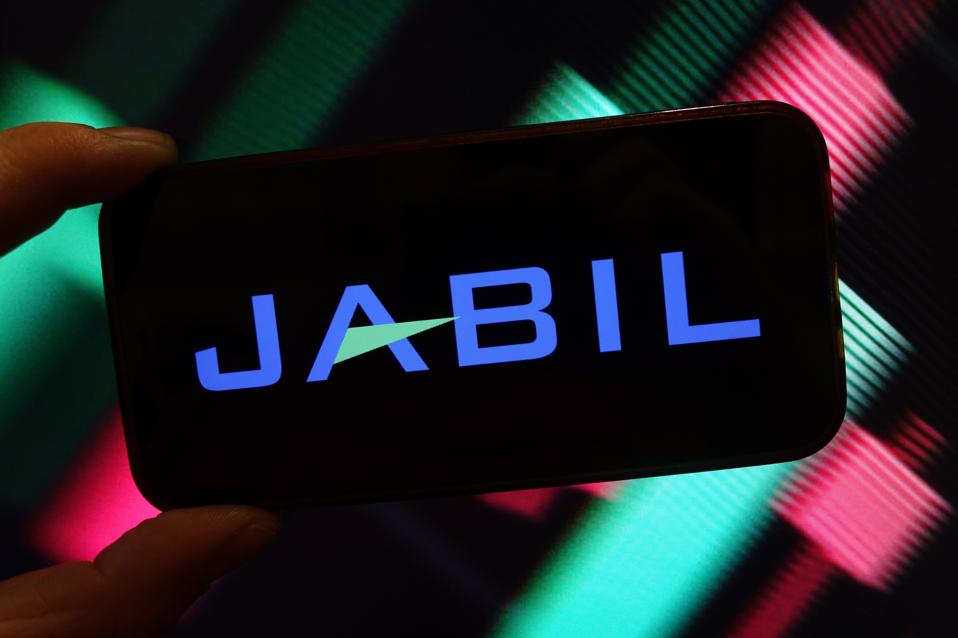 In this photo illustration, the Jabil Inc company logo is...