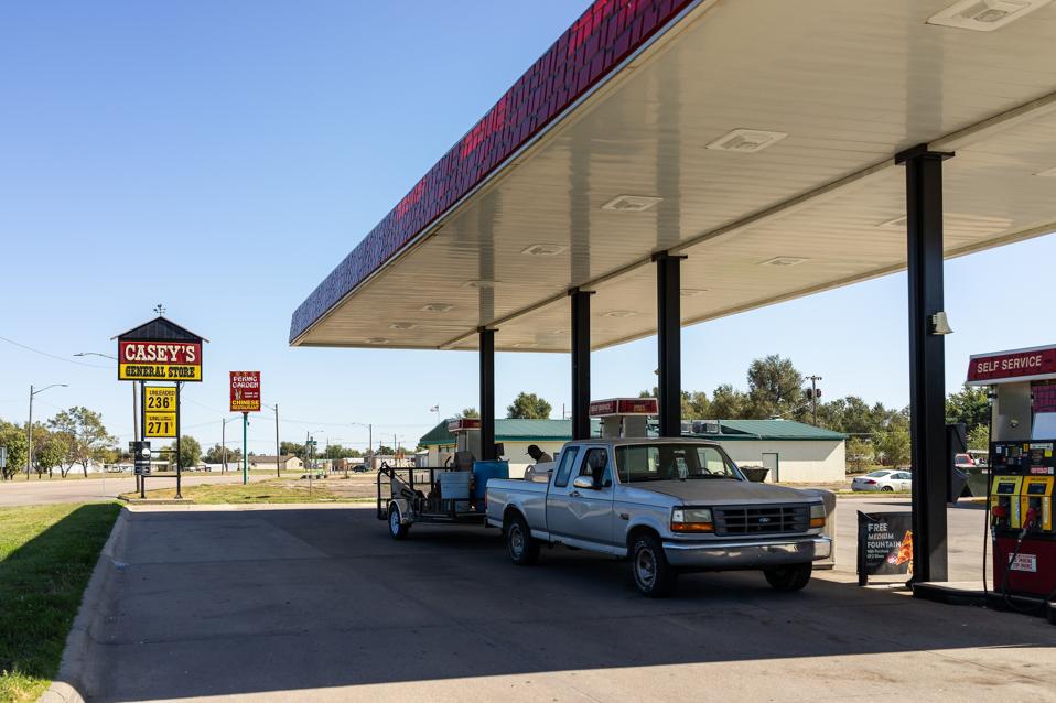 Small town in Kansas with exterior of building for Casey's General Store and gas station with pump