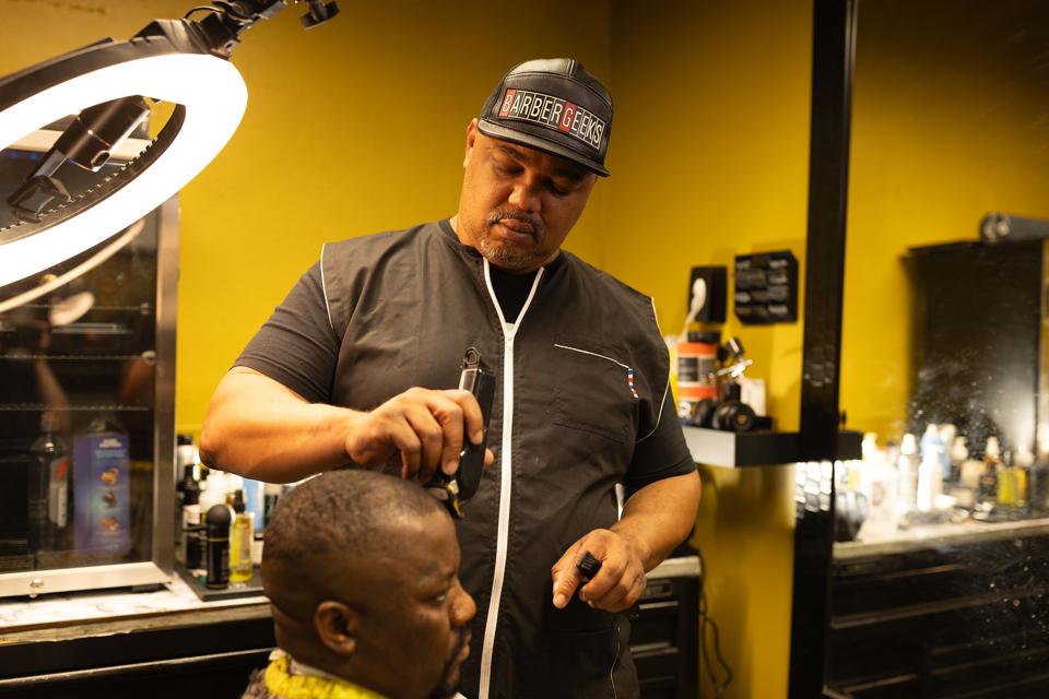 barber cutting hair