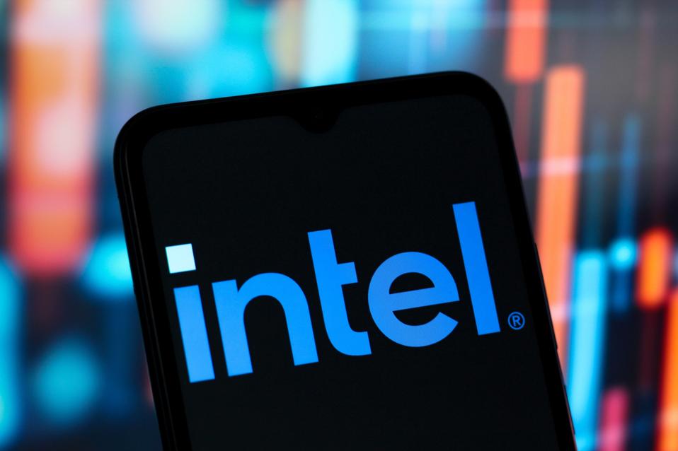 In this photo illustration, the Intel Corporation logo is...