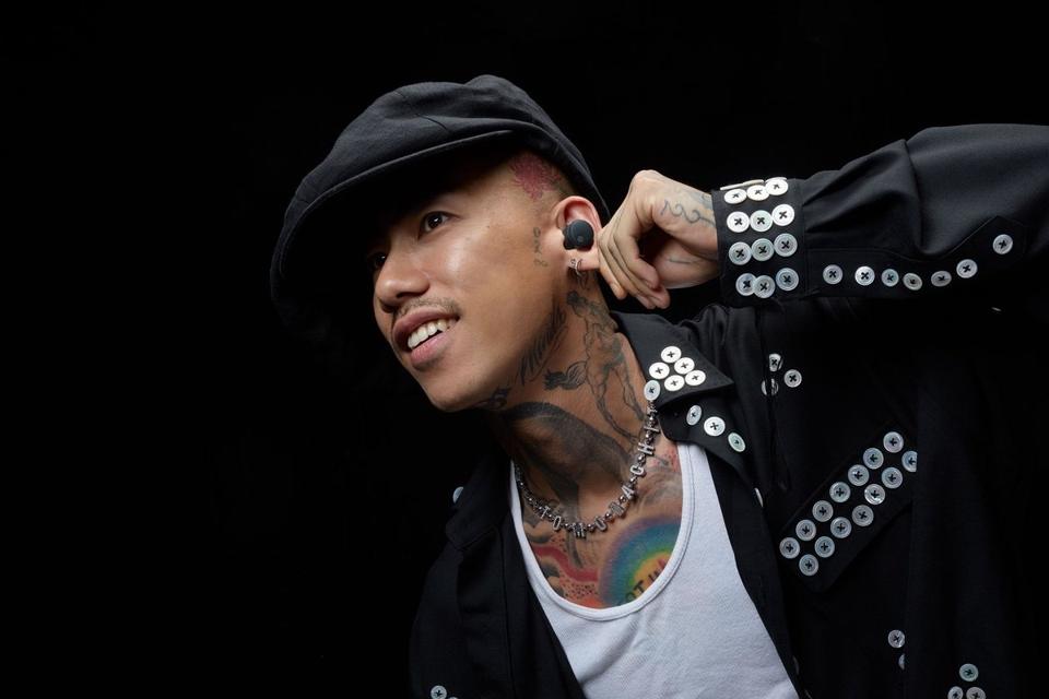 Man wearing Audio-Technica ATH-CKS50TW2 earbuds