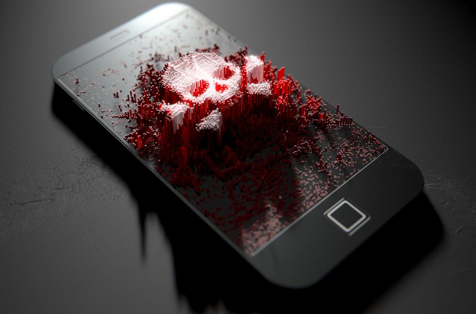 Generic smart phone screen emanating small pixels at random that build up to form a skull and cross bones
