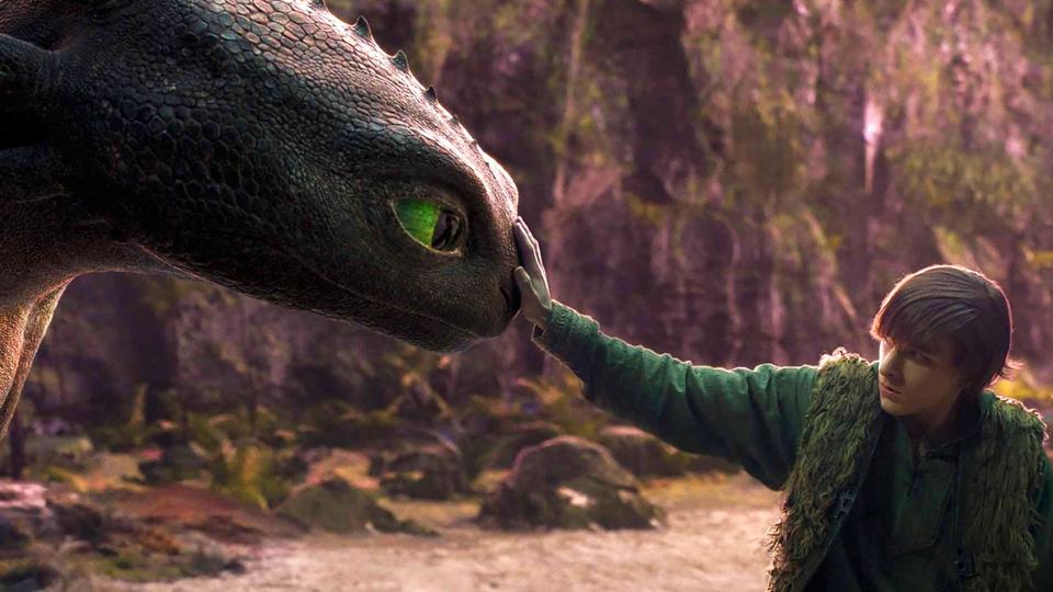 Toothless and Hiccup (Mason Thames) in "How to Train Your Dragon."