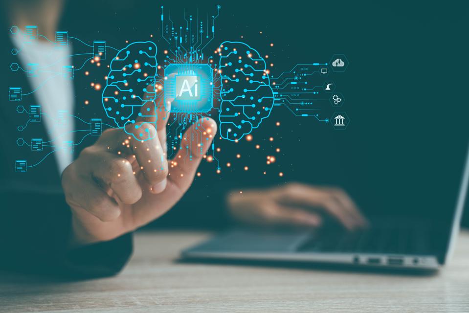 A person is pointing at a computer screen with a blue AI symbol