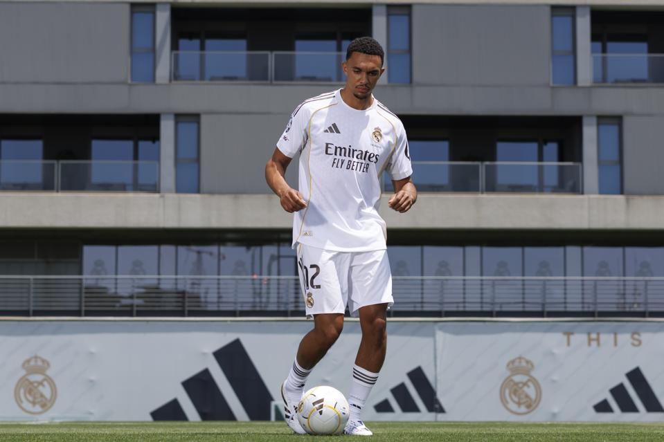 Real Madrid unveil new signing Trent Alexander-Arnold at their club base.