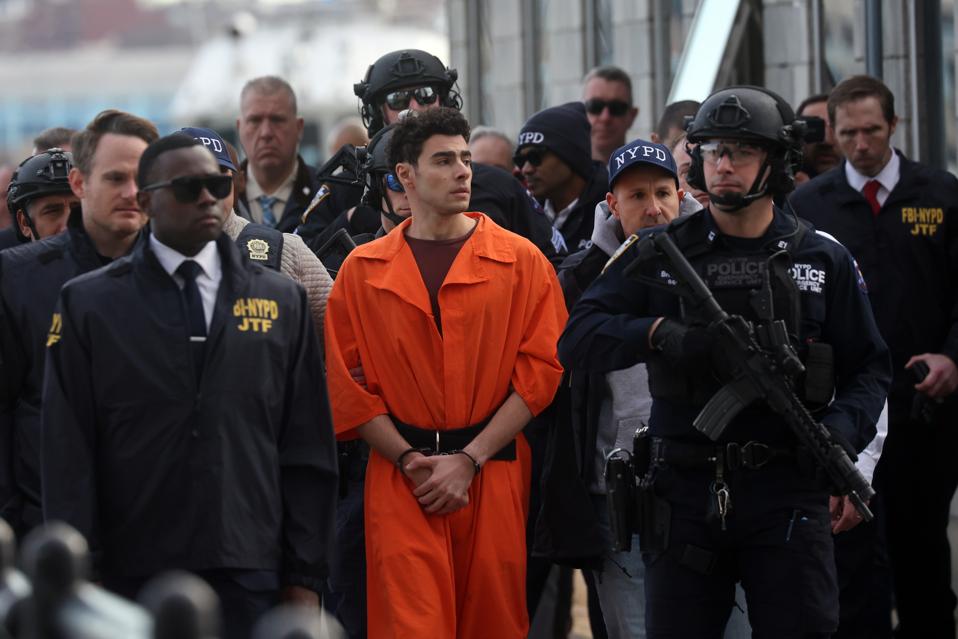 Insurance CEO Murder Suspect Luigi Mangione Is Extradicted To New York