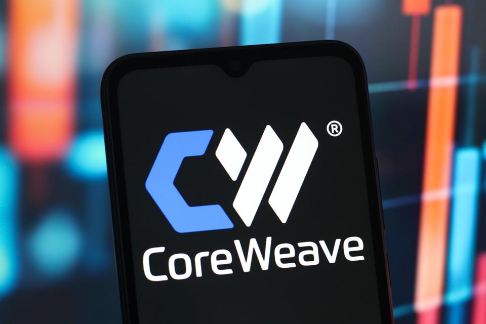 In this photo illustration, the CoreWeave (Core Weave) logo...