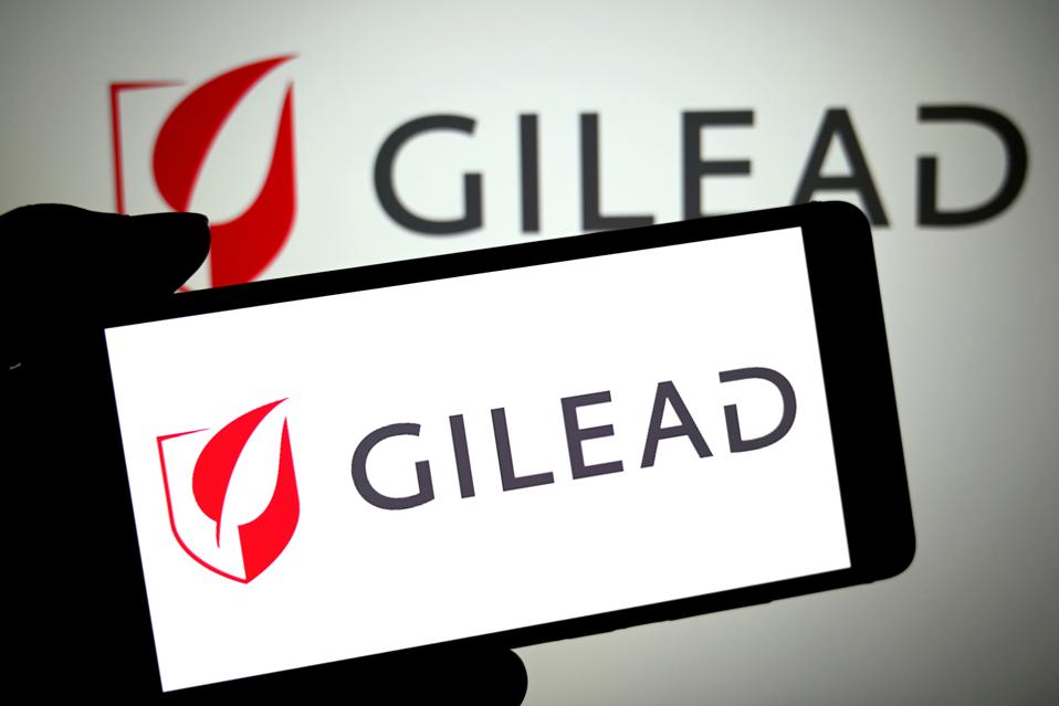 In this photo illustration, a Gilead Sciences logo is seen...
