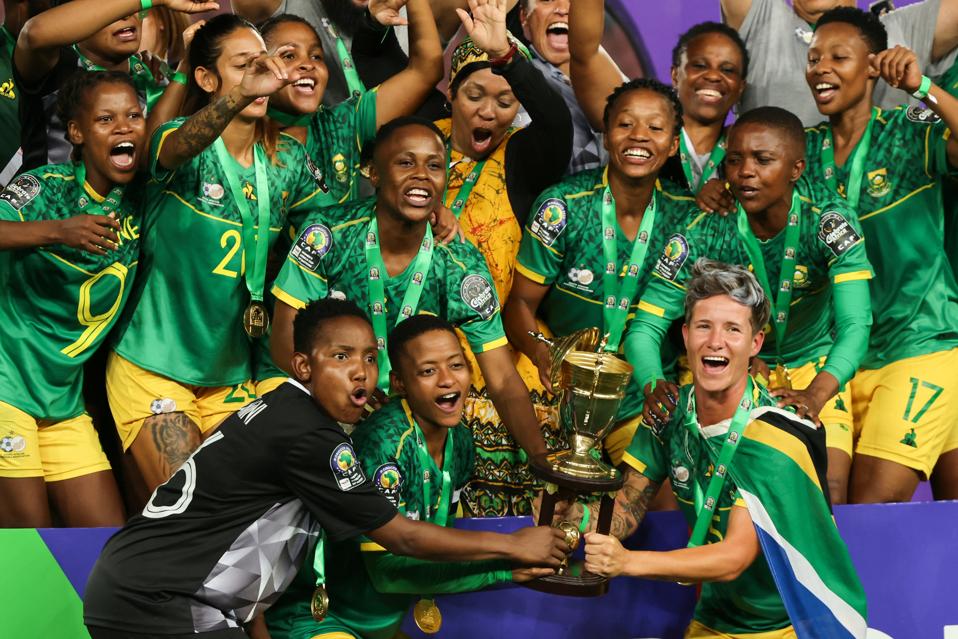 South Africa's players posing with the trophy after winning the 2022 WAFCON.