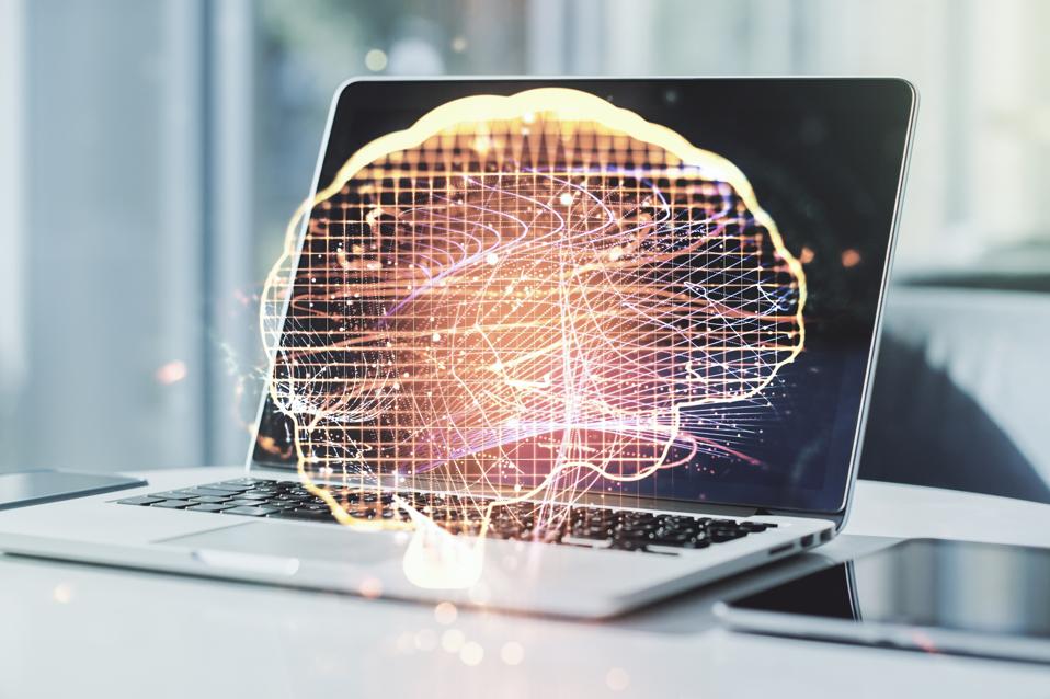 Double exposure of creative artificial Intelligence symbol with modern laptop on background. Neural networks and machine learning concept