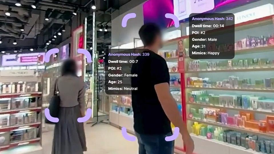 Shoppers looking at beauty products in a store