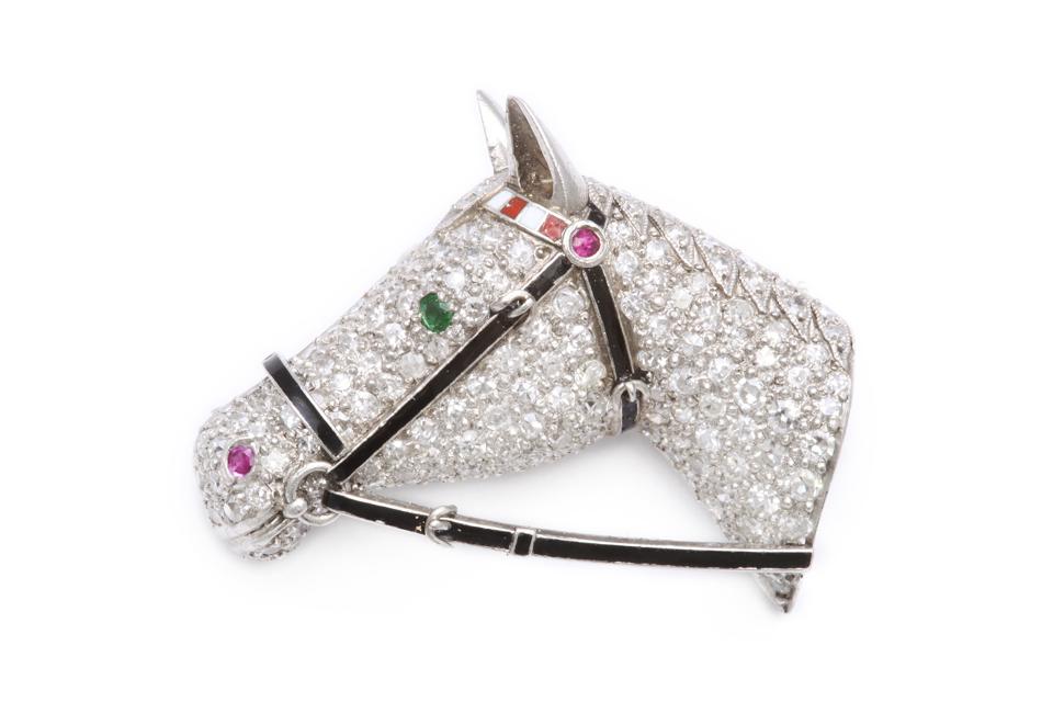 An unsigned pavé diamond horse head brooch offered by A La Vieille Russie