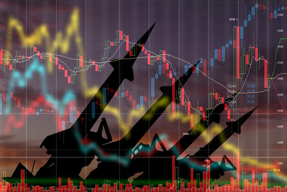 Missiles on the background of stock charts. Economic crisis due to war
