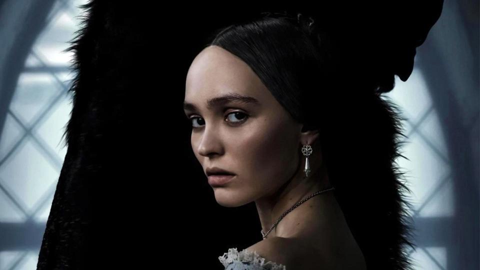 "Nosferatu" partial poster featuring Lily-Rose Depp and Bill Skarsgård.