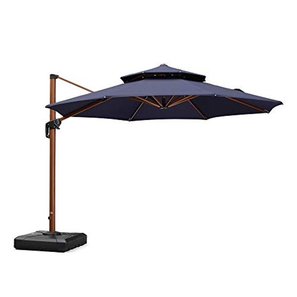 best patio umbrella stand for wind Choice Products 10ft 3-Tier Umbrella, Market Sun Shade w/ Tilt Adjustment, Easy Crank Enjoy maximum shade with our new 360 LED Cantilever Offset Umbrella Best Choice Products 123lb Capacity