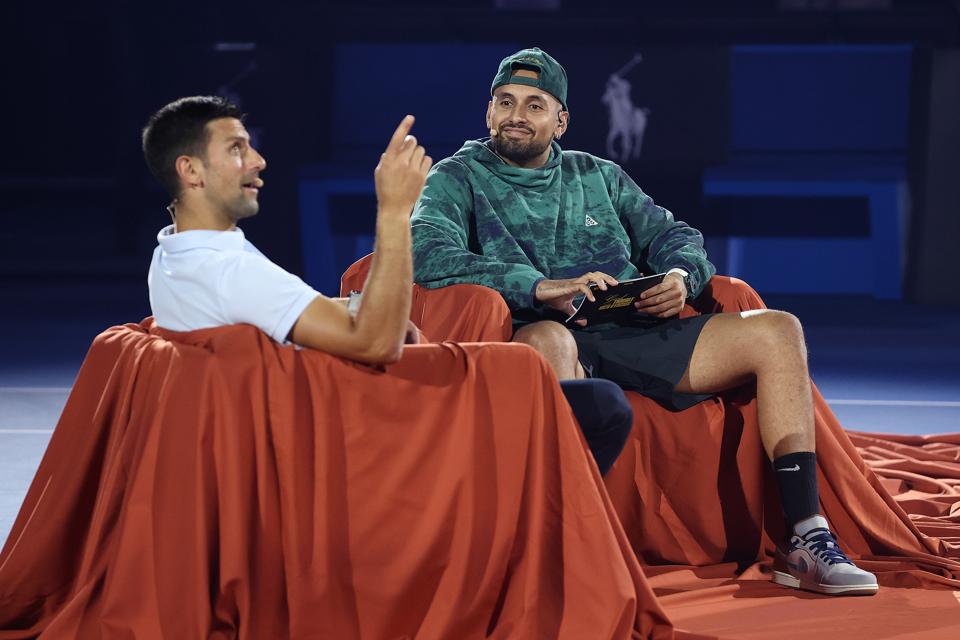 Nick Kyrgios interviews Novak Djokovic during a charity game ahead of the Australian Open.