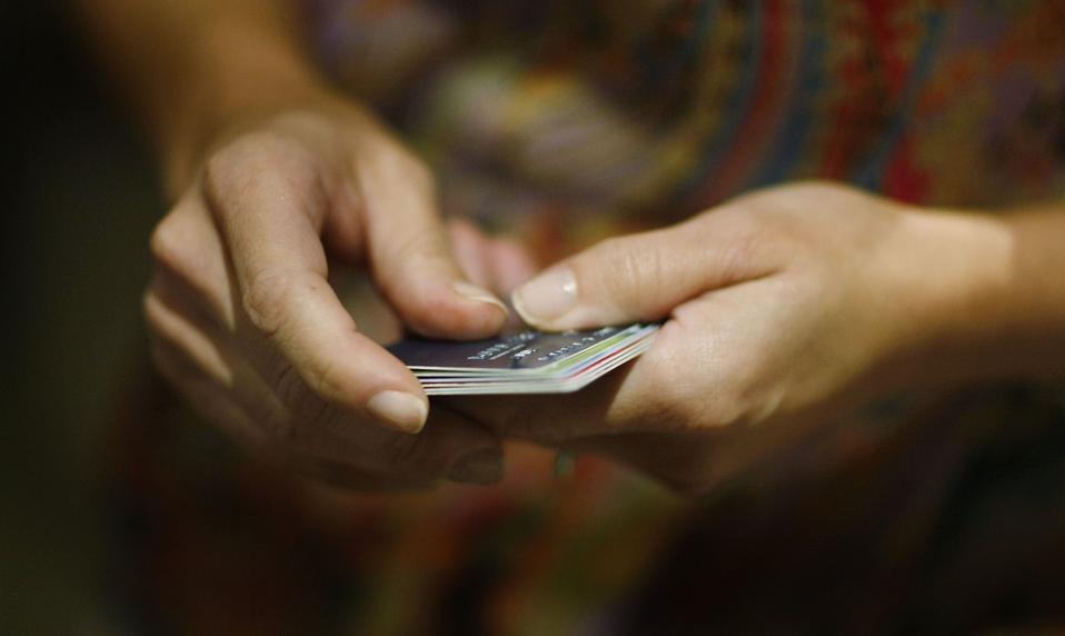 Hands with credit cards