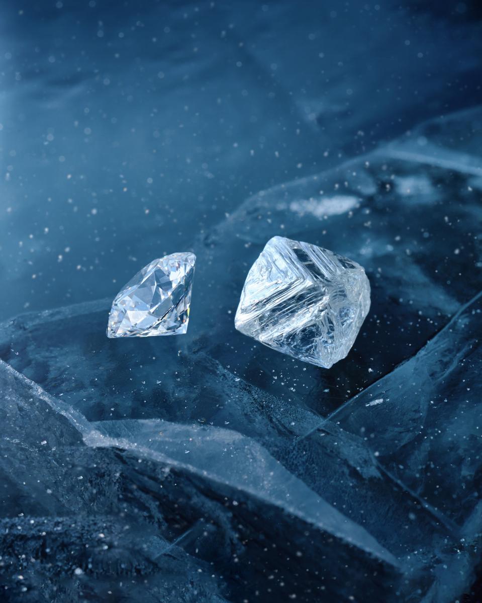 Image of a round brilliant diamond and a natural diamond crystal