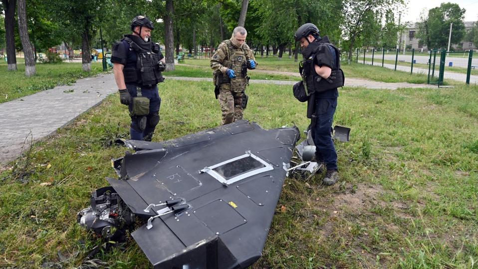 Ukrainian forces examine parts of a Shahed 136 drone in Kharkiv on June 4, 2025