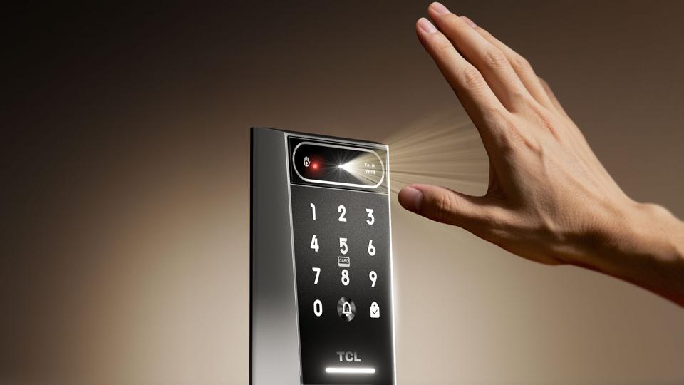 A hand being held up to a TCL Smart Lock D2 Pro smart lock