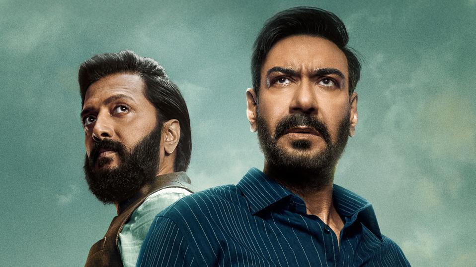 Indian stars Ajay Devgn and Riteish Deshmukh on a poster of Hindi film 'Raid 2'.
