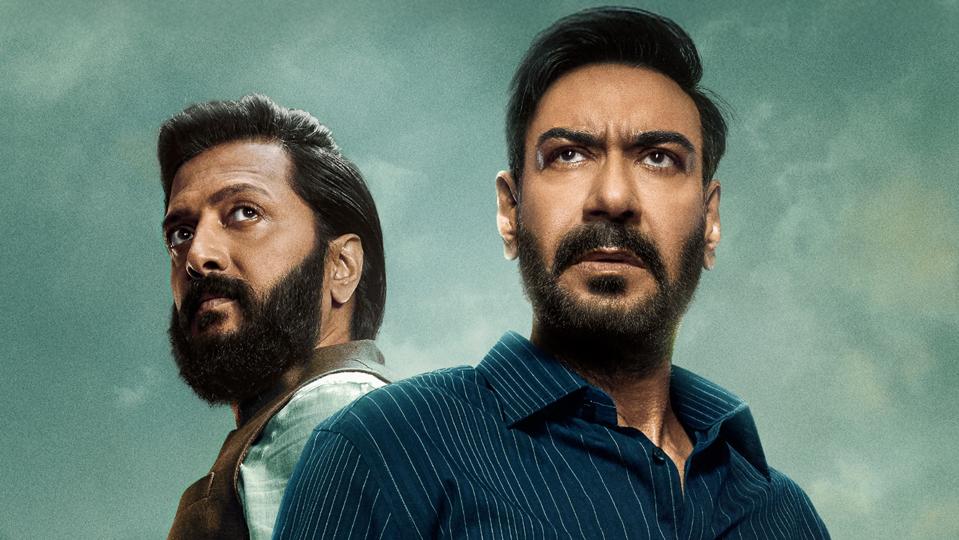 Indian stars Ajay Devgn and Riteish Deshmukh on a poster of Hindi film 'Raid 2'.