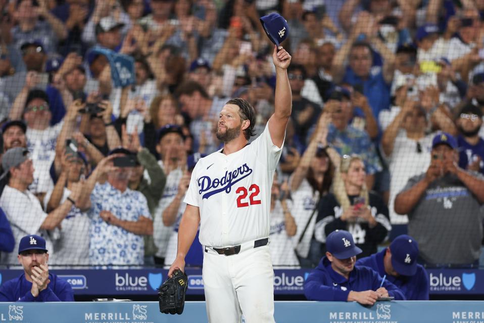 Clayton Kershaw tipping his cap to the fans in Dodger Stadium after 3,000th strikeout.