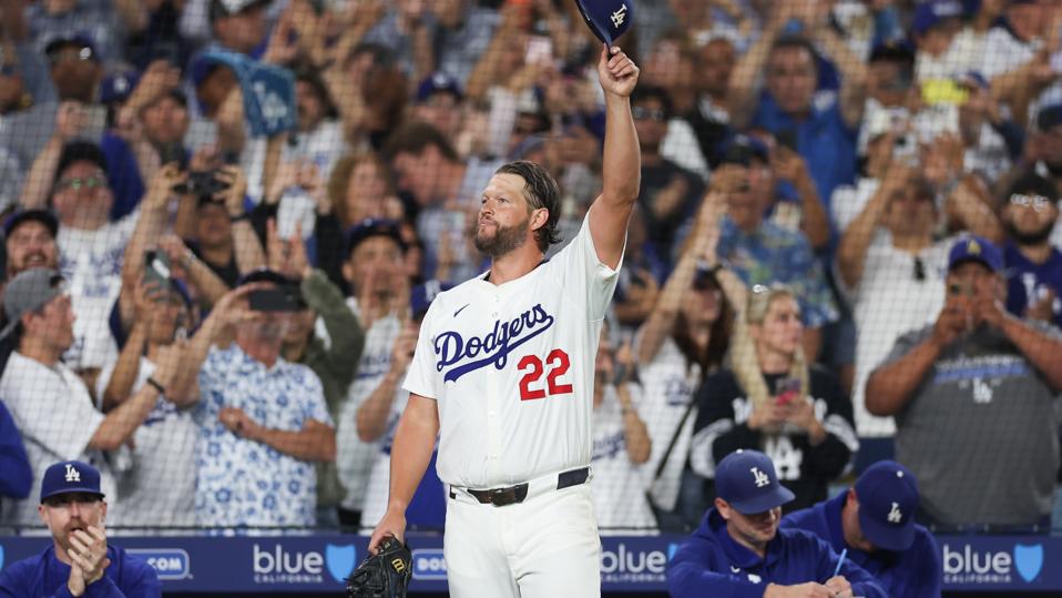 Clayton Kershaw tipping his cap to the fans in Dodger Stadium after 3,000th strikeout.
