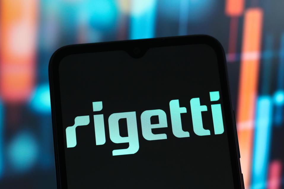 In this photo illustration, the Rigetti Computing logo is...