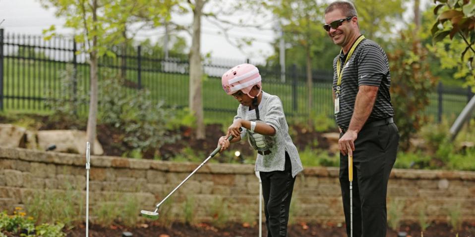 Kevin Corn with a patient