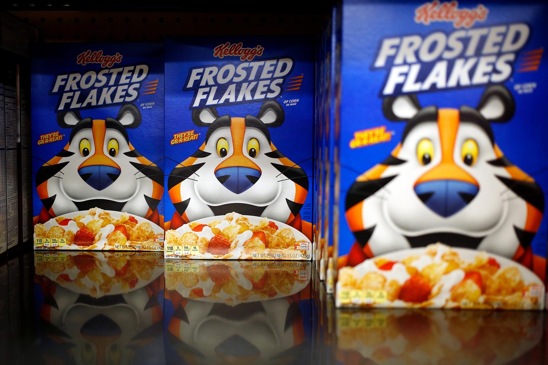 Three boxes of Kellogg's Frosted Flakes cereal.