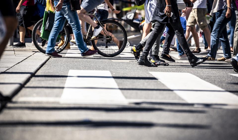 a street-level photo of people walking