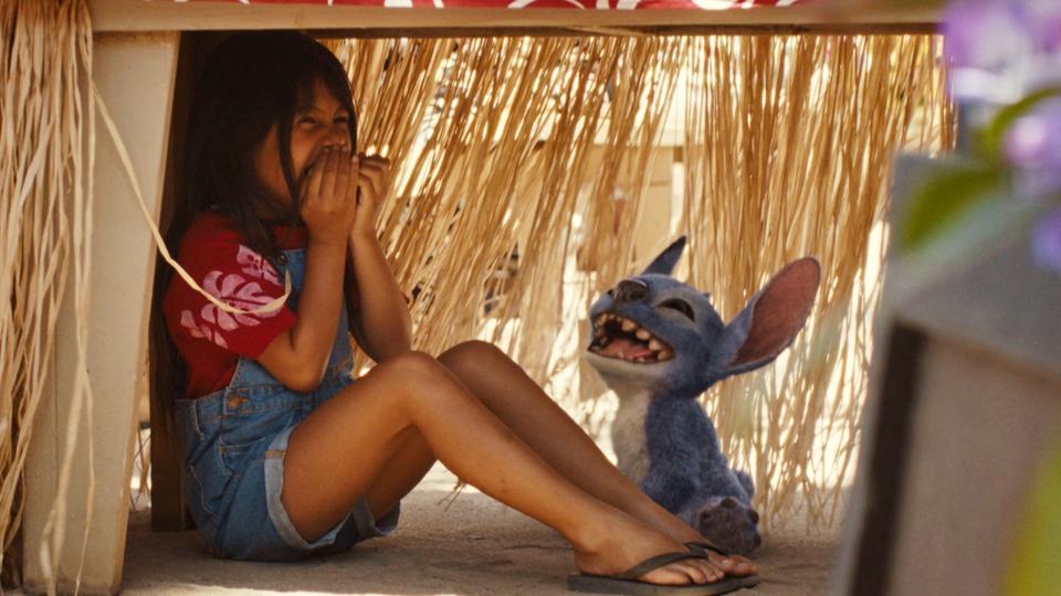 Lilo (Maia Kealoha) and Stitch (voice of Chris Sanders) in "Lilo & Stitch."