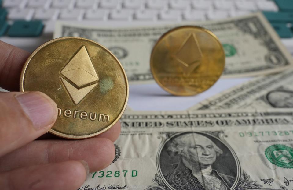 US Dollars And Ethereum Coins