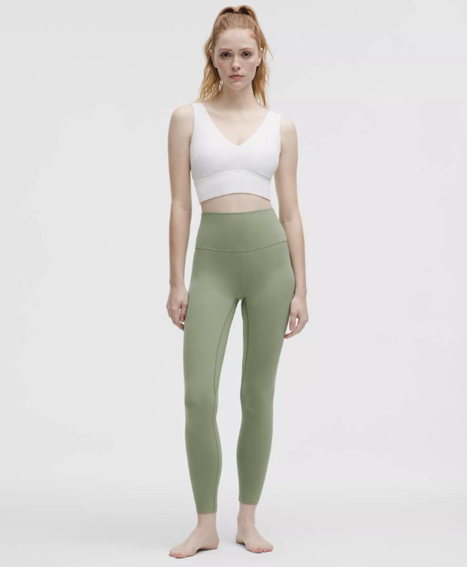 Model wearing Lululemon Align High-Rise Pant in Desert Green.