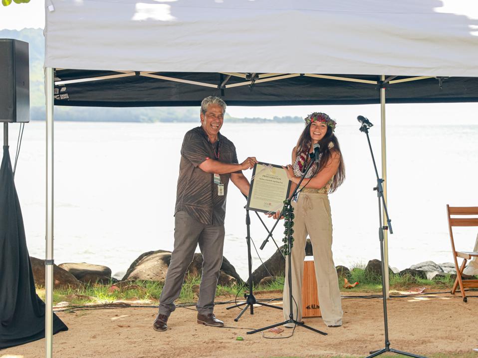 Sydney Agudong receives the "Sydney Elizebeth Agudong Day" proclamation from the Mayor of Kaua'i