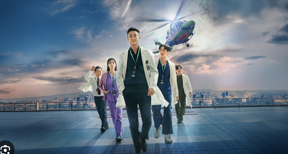 A group of doctors walk away from a helicopter.