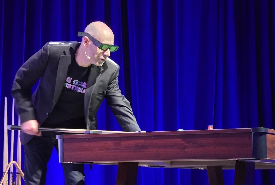 Inbar playing pool at AWE 2025