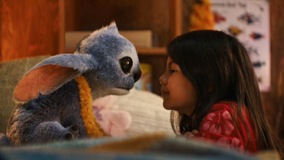 Stitch (voice of Chris Sanders) and Lilo (Maia Kealoha) in "Lilo & Stitch."