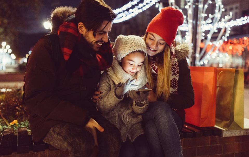 Young couple enjoying Christmas in the city