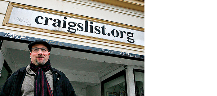 Craigslist founder, Craig Newmark, poses in front of the Craigslist office March 21, 2006 in San Francisco, California