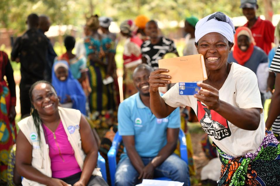 HEADER IMAGE - Credit AVSI Foundation - A woman in Uganda attains financial agency